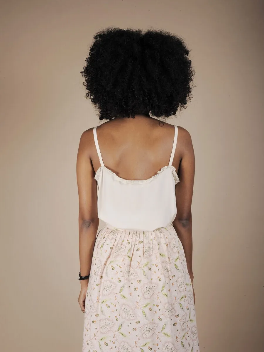 Top in pura seta e pizzo champagne